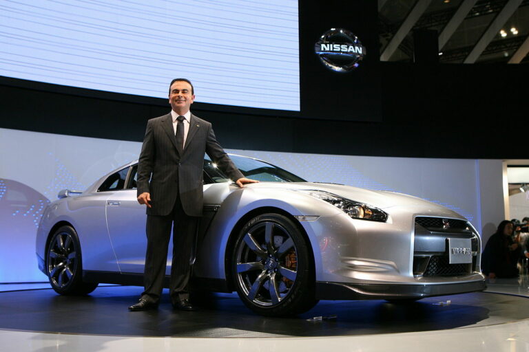 Carlos Ghosn with Nissan GT-R - now Japan tortures Ghosn