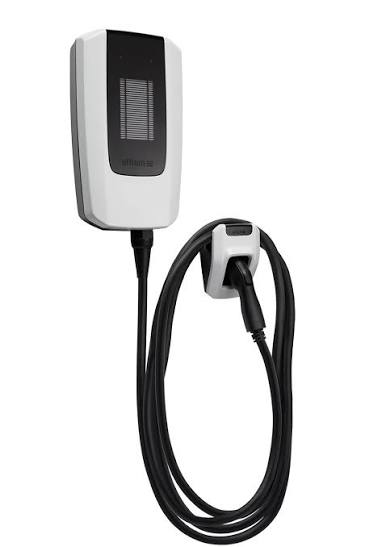GM Ultium home charger, white in color, with heavy cable coiled under charger